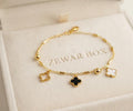 Gold-Tone Multi-Clover Charm Station Bracelet - Black, White & Open Clover | Zewar Box