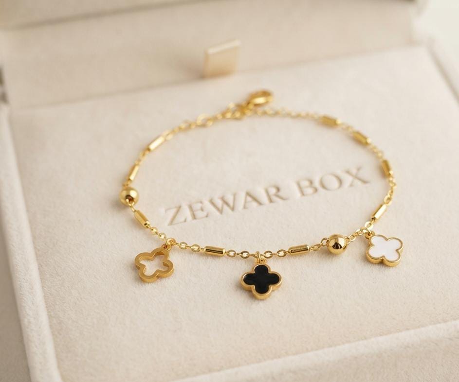 Gold-Tone Multi-Clover Charm Station Bracelet - Black, White & Open Clover | Zewar Box